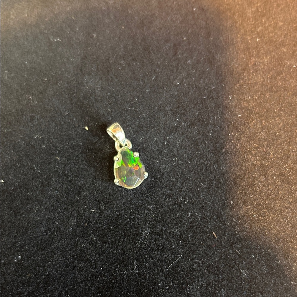 Silver Pendant with Green Gemstone